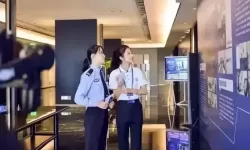 张律渝携手吕总共赏落地窗风景，共绘未来宏图